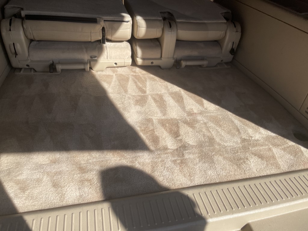 Deep-cleaned vehicle carpet